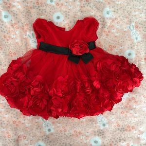 Red dress for a baby girl of 3 month